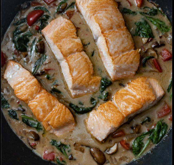 Pan-seared salmon in coconut cream sauce